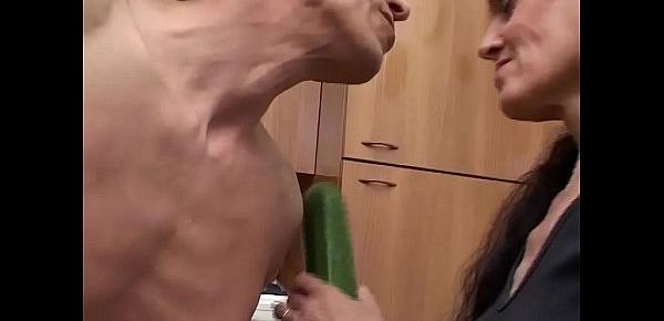  Horny grandma plays with zucchini and cock